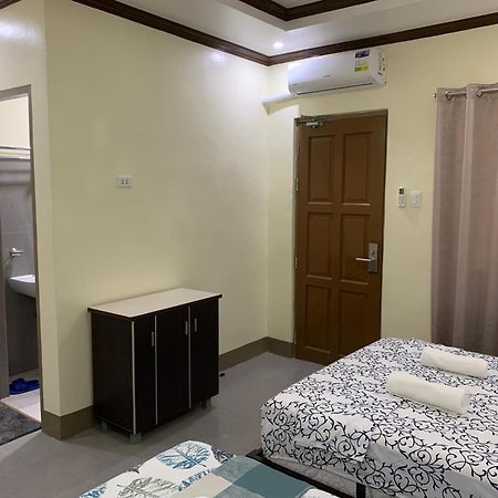 Zl Travelers Inn Batuan Экстерьер фото