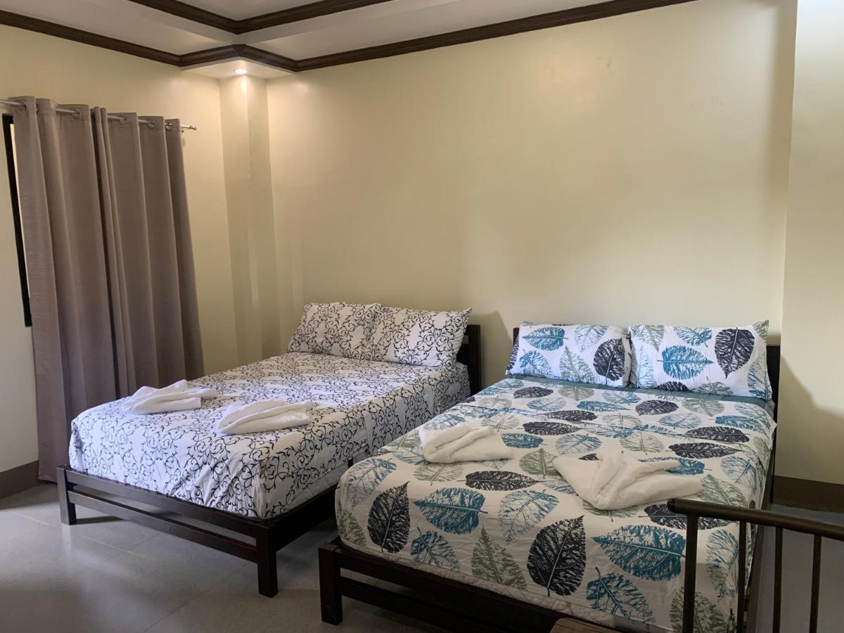 Zl Travelers Inn Batuan Экстерьер фото