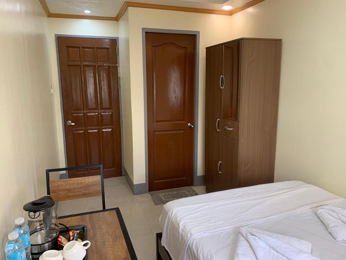 Zl Travelers Inn Batuan Экстерьер фото