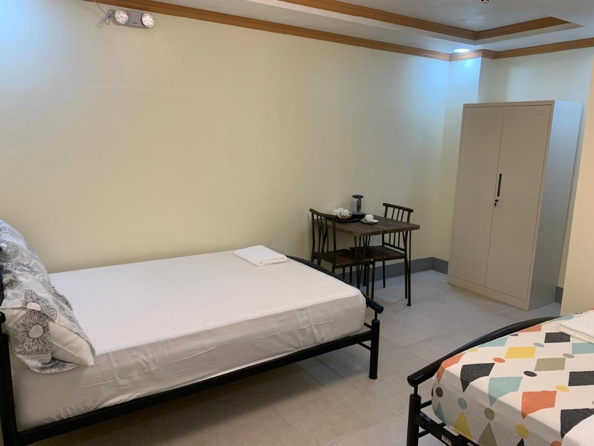 Zl Travelers Inn Batuan Экстерьер фото