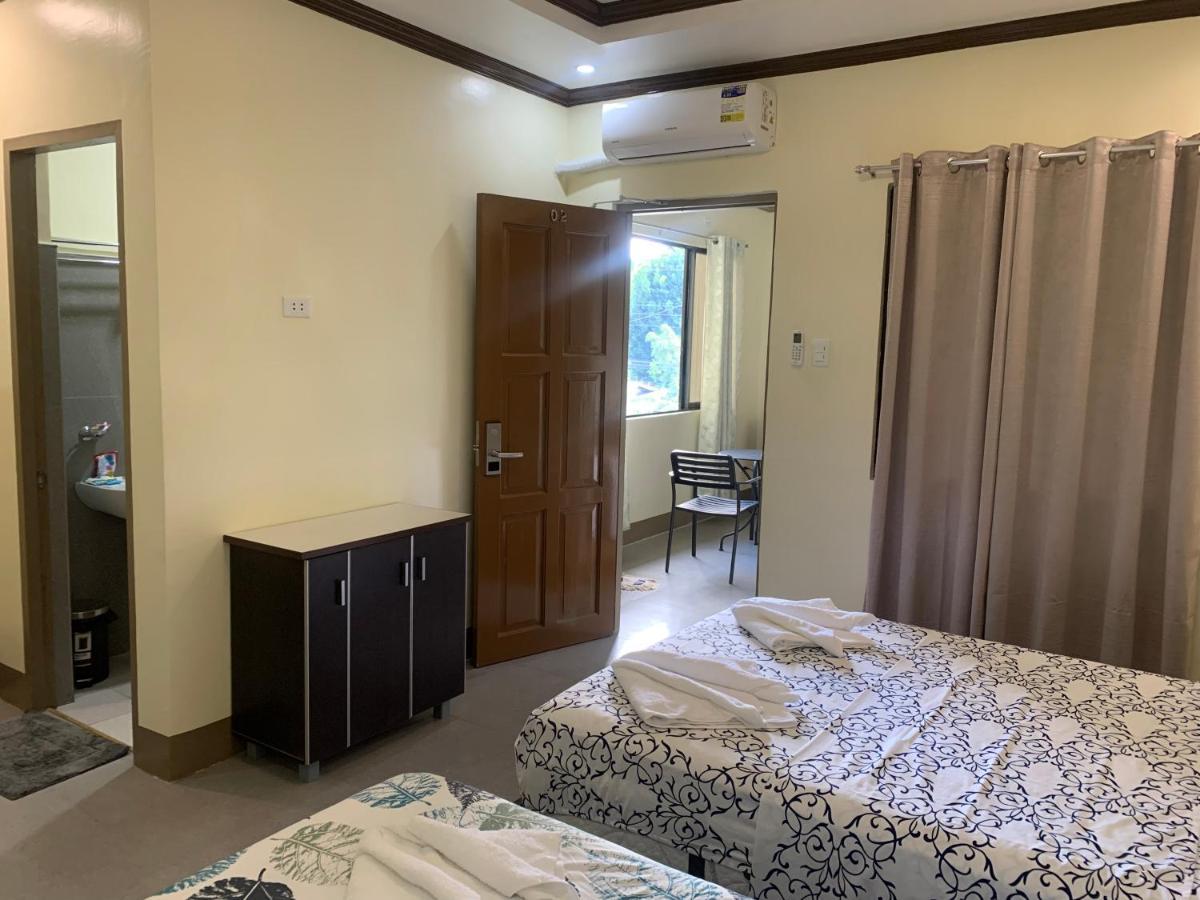 Zl Travelers Inn Batuan Экстерьер фото
