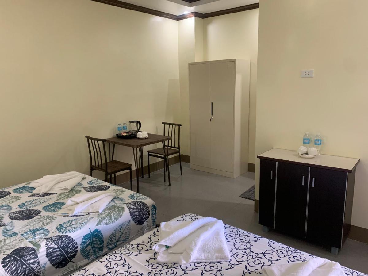 Zl Travelers Inn Batuan Экстерьер фото