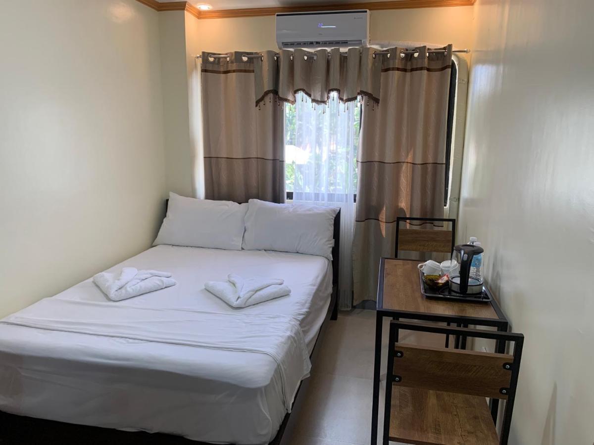 Zl Travelers Inn Batuan Экстерьер фото