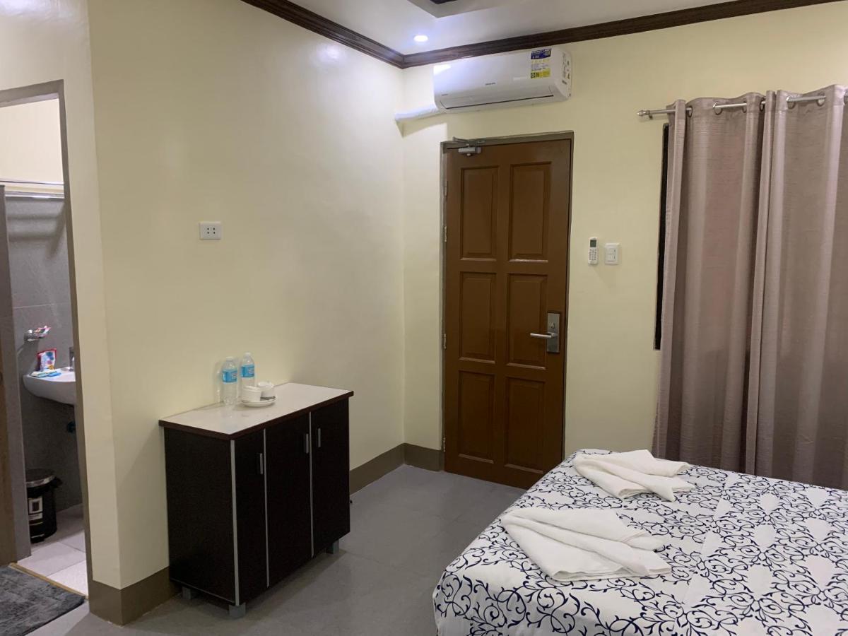 Zl Travelers Inn Batuan Экстерьер фото
