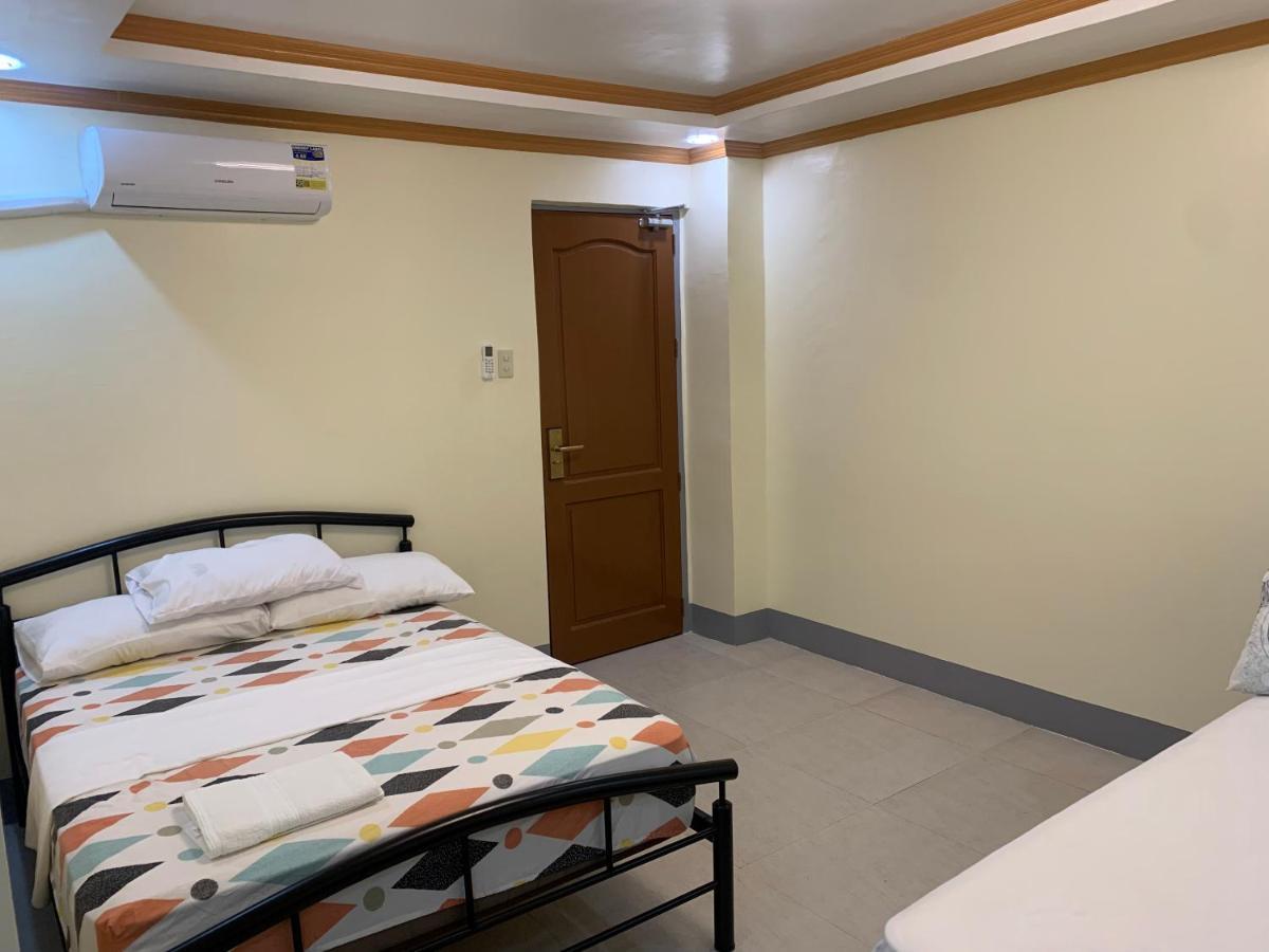 Zl Travelers Inn Batuan Экстерьер фото
