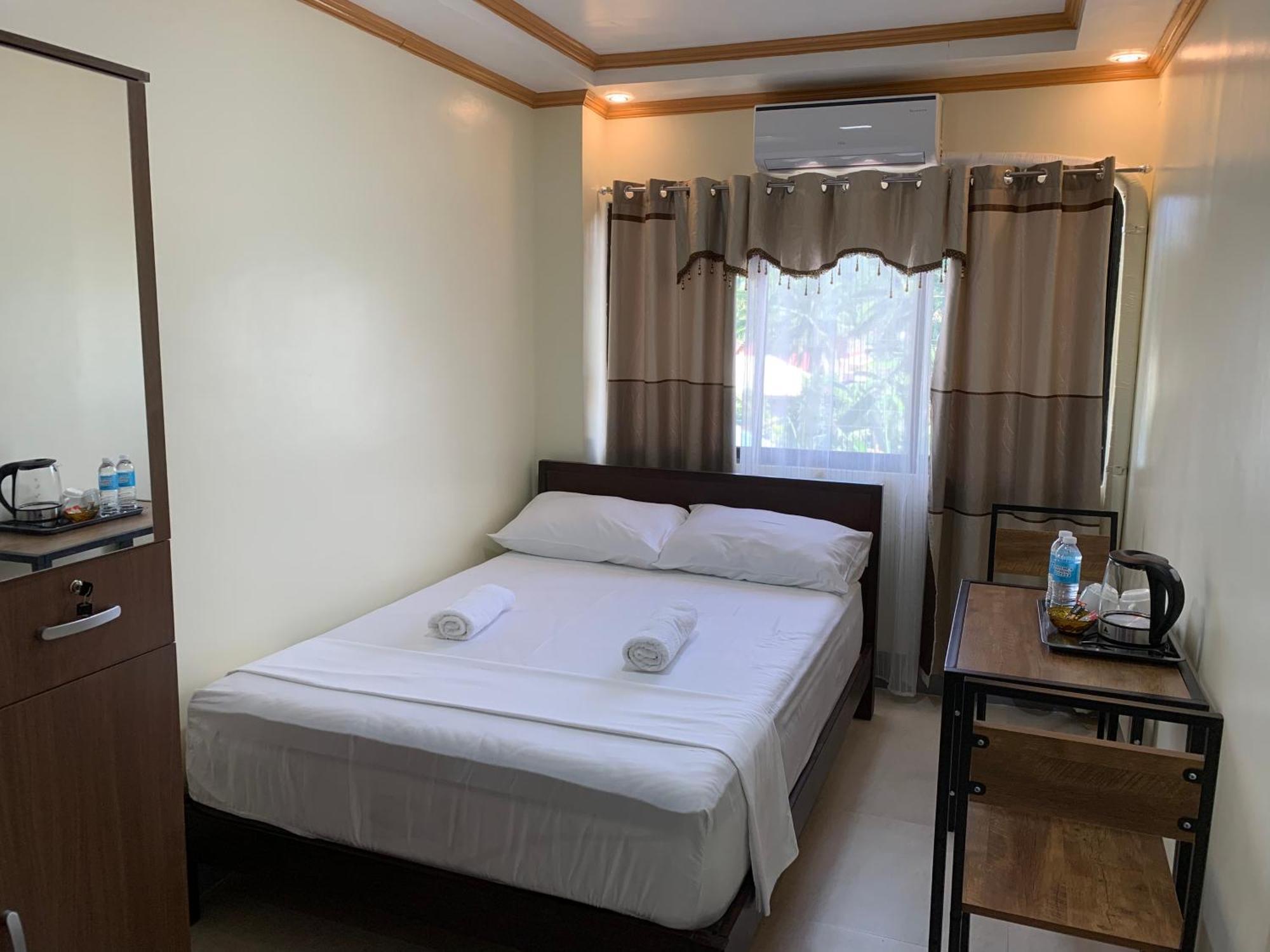 Zl Travelers Inn Batuan Экстерьер фото