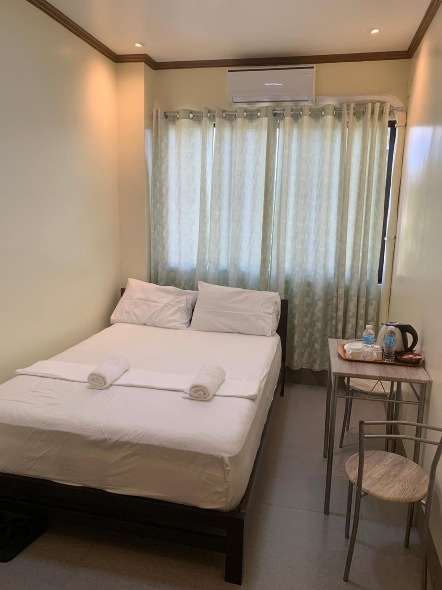 Zl Travelers Inn Batuan Экстерьер фото