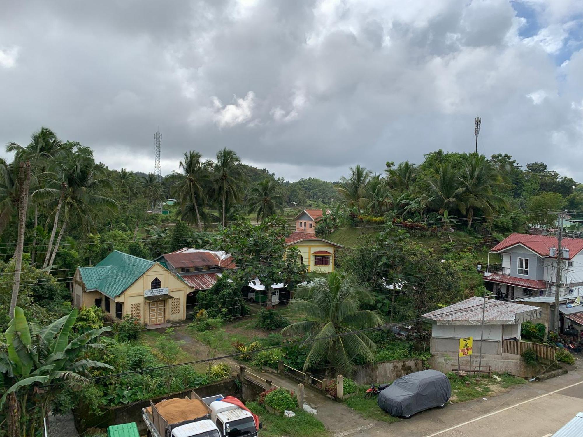 Zl Travelers Inn Batuan Экстерьер фото