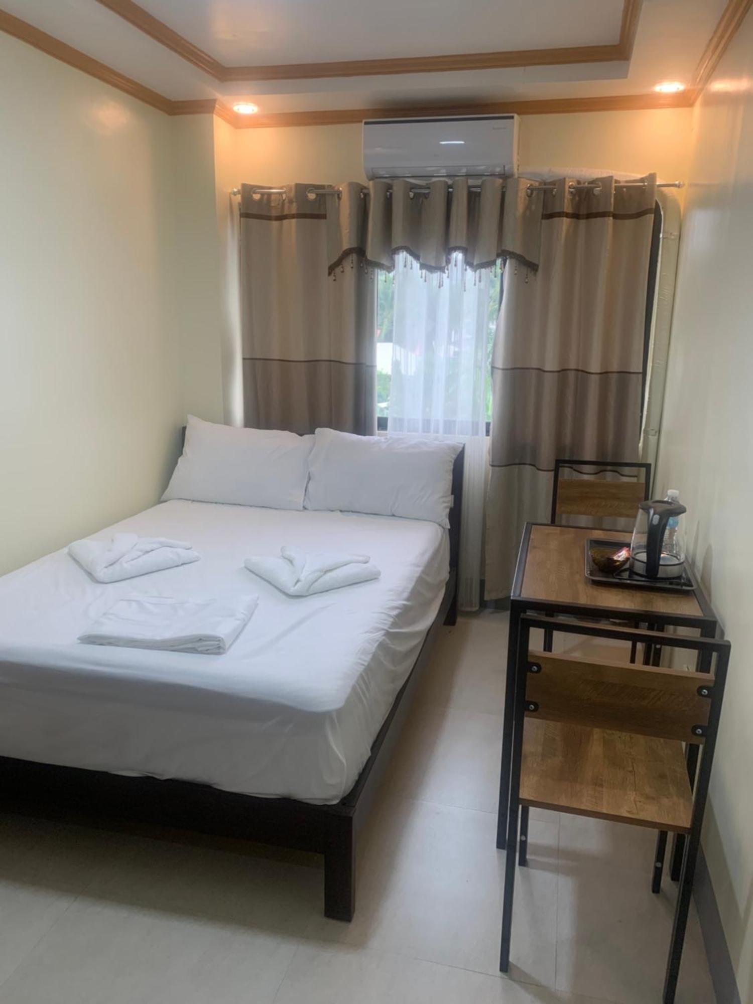 Zl Travelers Inn Batuan Экстерьер фото